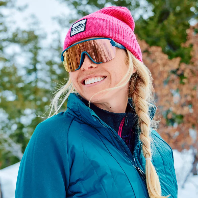 Woman wearing Smartloft insulation in the snow