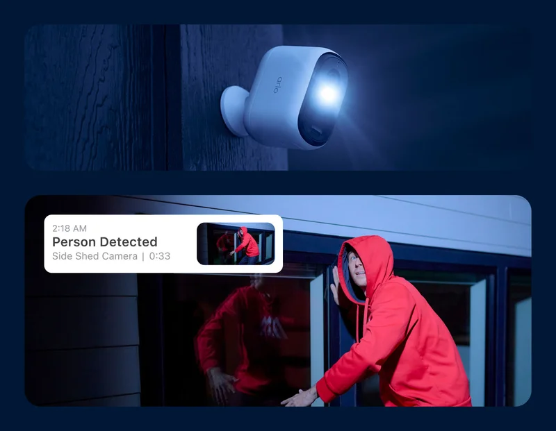 Arlo Essential Camera mounted on the exterior of a home at night with integrated spotlight turned on. Simulated Arlo Secure point of view image depicts a burglar at night and a simulated feed interface element says: 2:18 AM, Person Detected, Side Shed Camera, 0:33.