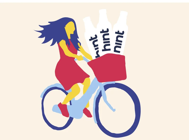 Illustration of a woman on a bike with Hint bottles in the front basket.