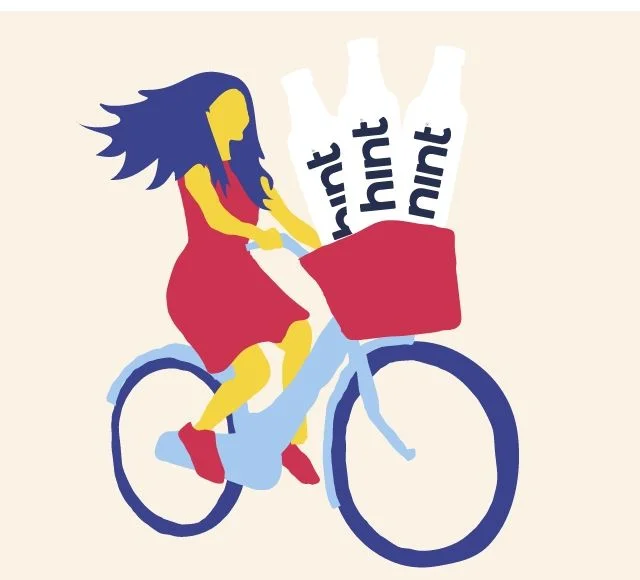 Illustration of a woman on a bike with Hint bottles in the front basket.