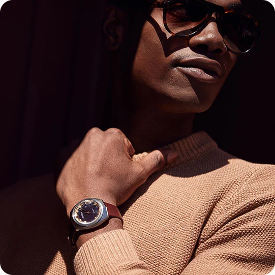 Man wearing Eco-Drive 365 BN1010-05E watch
