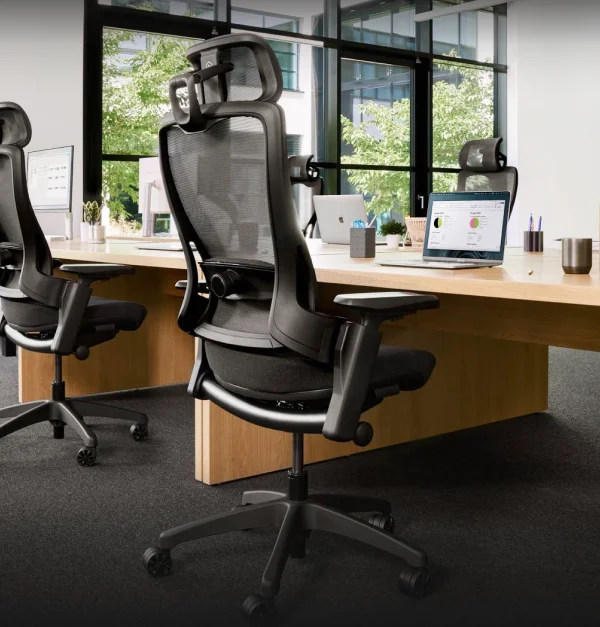 Elgato Embrace at desk in an open office space.