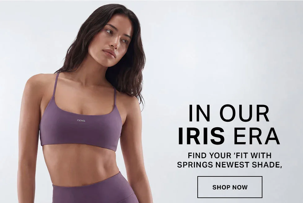 Woman in a Nova Iris purple activewear sports bra and matching leggings. Promoting the new spring fitness collection and latest shade.