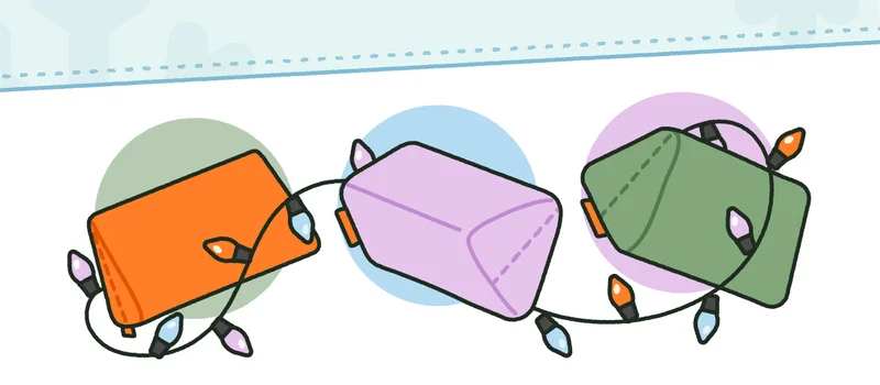 Three pillows in colors of Nuggeteer (now retired), Moonshot and Bamboo, covered in holiday lights.