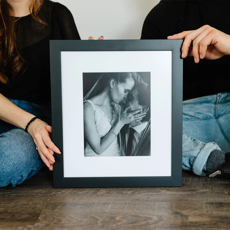 Framed print of couple.