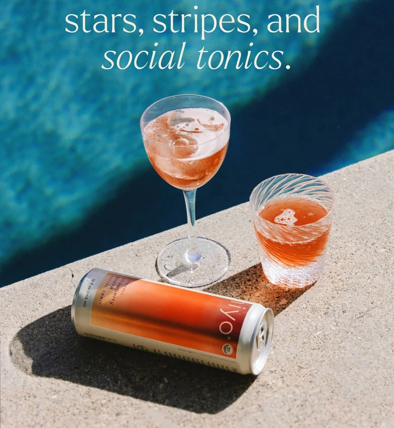 stars, stripes, and social tonics. beautiful photo of strawberry guava hiyo can and glass by the pool