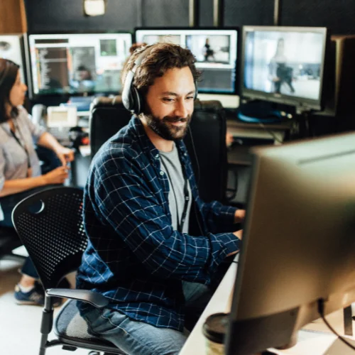 Fellow works on a computer at a Sundance lab.