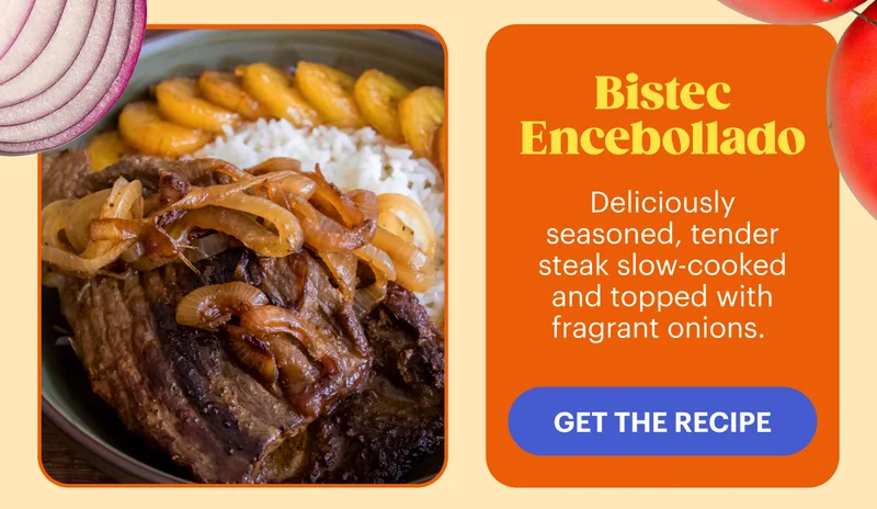 Bistec Encebollado: Deliciously seasoned, tender steak slow-cooked and topped with fragrant onions.