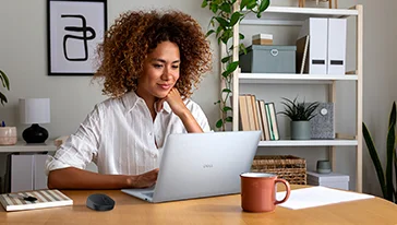 Young Woman Working From Home Office