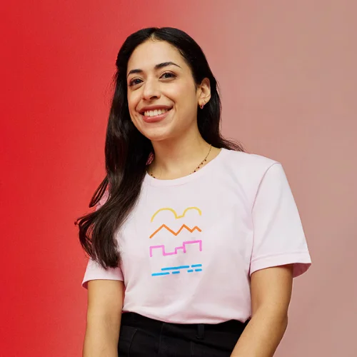 Model wears the Rosy Pink Tee.