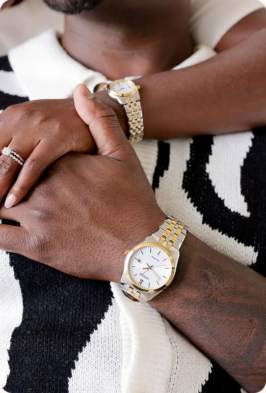 A couple wearing Citizen watches