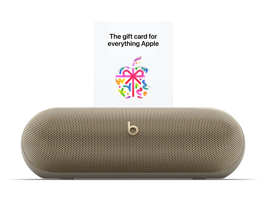 Beats Pill in Champagne Gold with gift card above it.