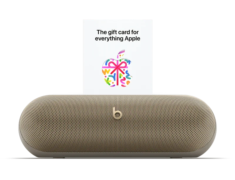 Beats Pill in Champagne Gold with gift card above it.