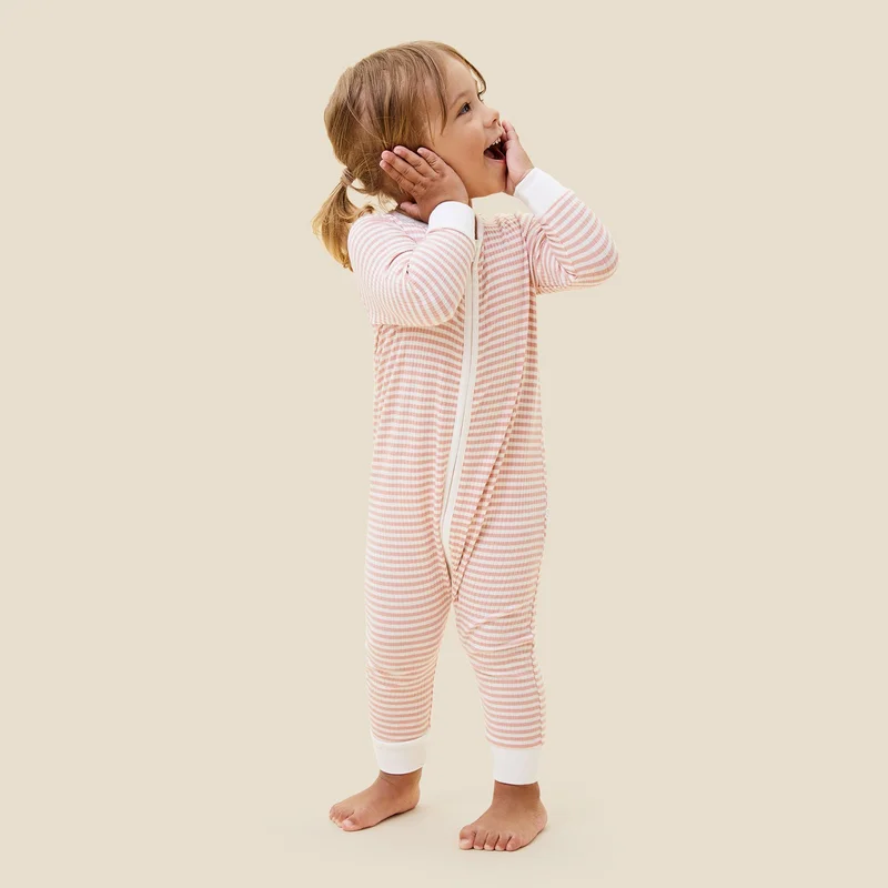 Image of Pink Stripe Ribbed Clever Zip Footed Baby Pajamas