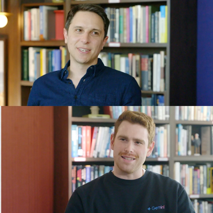 Two smiling men, one top and one bottom, against bookshelves. Top in blue shirt, bottom in 'Gemini' shirt with mustache.