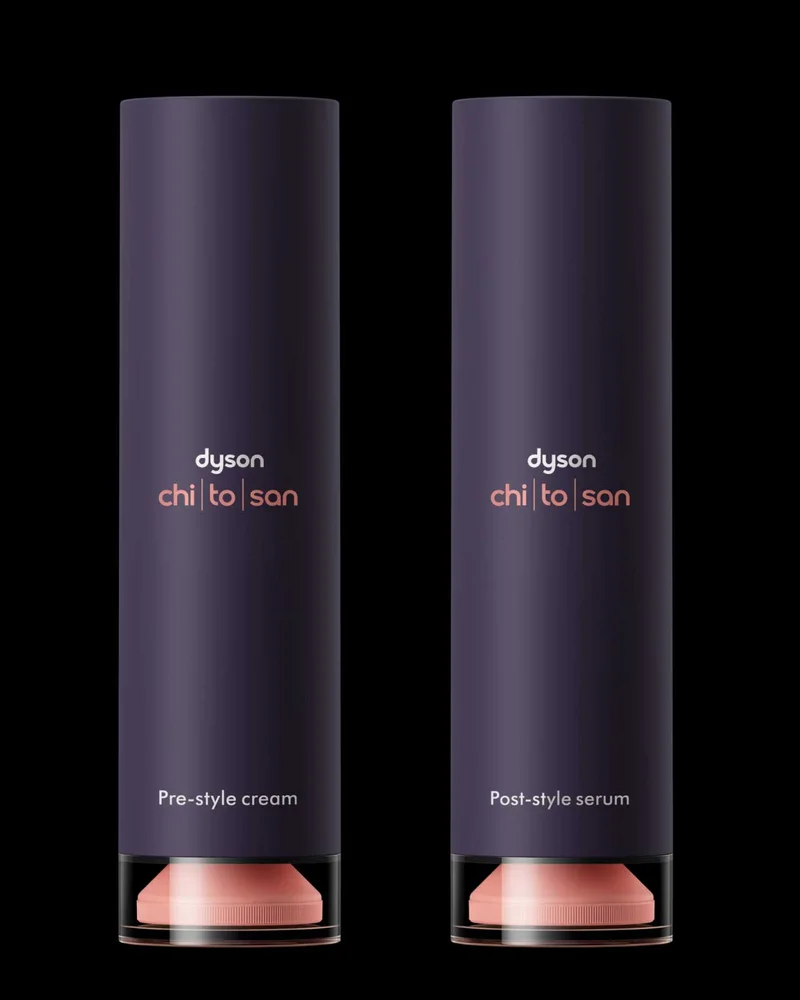 Two bottles of Dyson Chitosan Pre-style cream and Post-style serum.