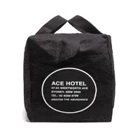 Rotating view of sturdy duffel bags featuring the Ace Hotel logo, perfect for travel or everyday use.