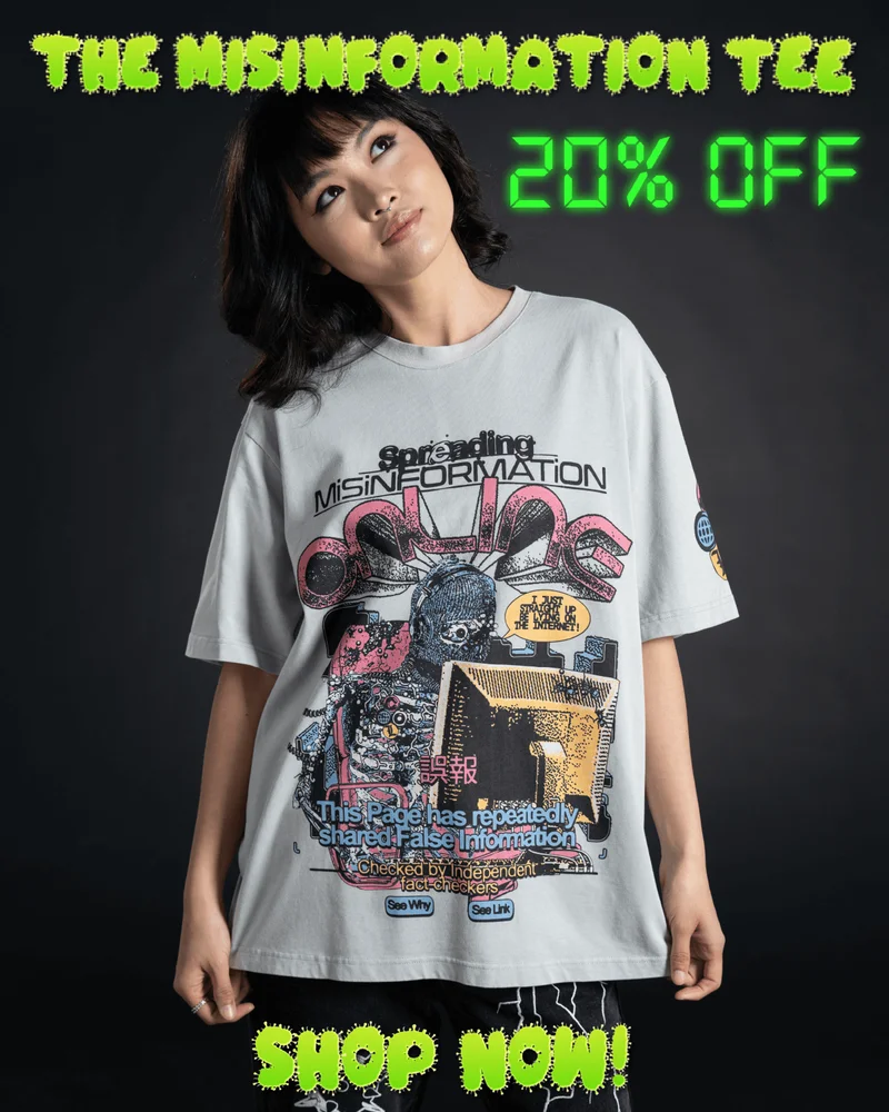 The Misinformation Tee. 20% off. Shop now! [image of a young woman wearing The Misinformation Tee, posing in front of a black background]