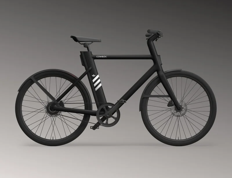 A photographic render showing a Cowboy Classic with Adidas branding on its saddle pillar