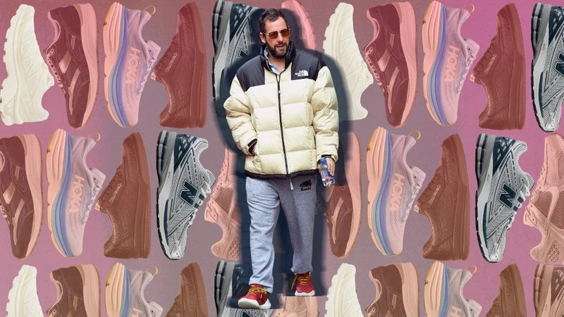 Image may contain: Adam Sandler, Clothing, Coat, Jacket, Footwear, Shoe, Sneaker, Adult, Person, Pants, and Accessories
