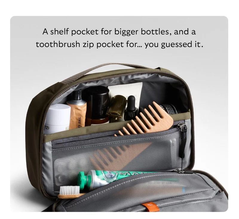 A shelf pocket for bigger bottles, and a toothbrush zip pocket for… you guessed it.