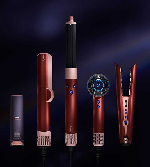 Dyson Beauty devices in Strawberry bronze and the Dyson Chitosan styling products.