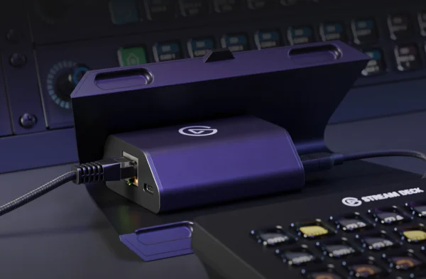 Elgato Network Dock device sitting on desk.