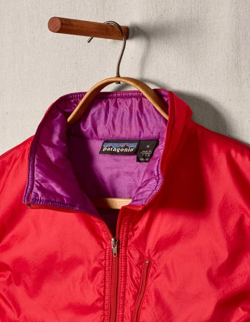 A jacket hanging on a hanger.
