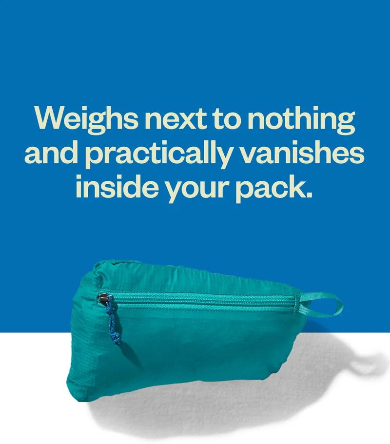 The Houdini Jacket weighs next to nothing and practically vanishes inside your pack.