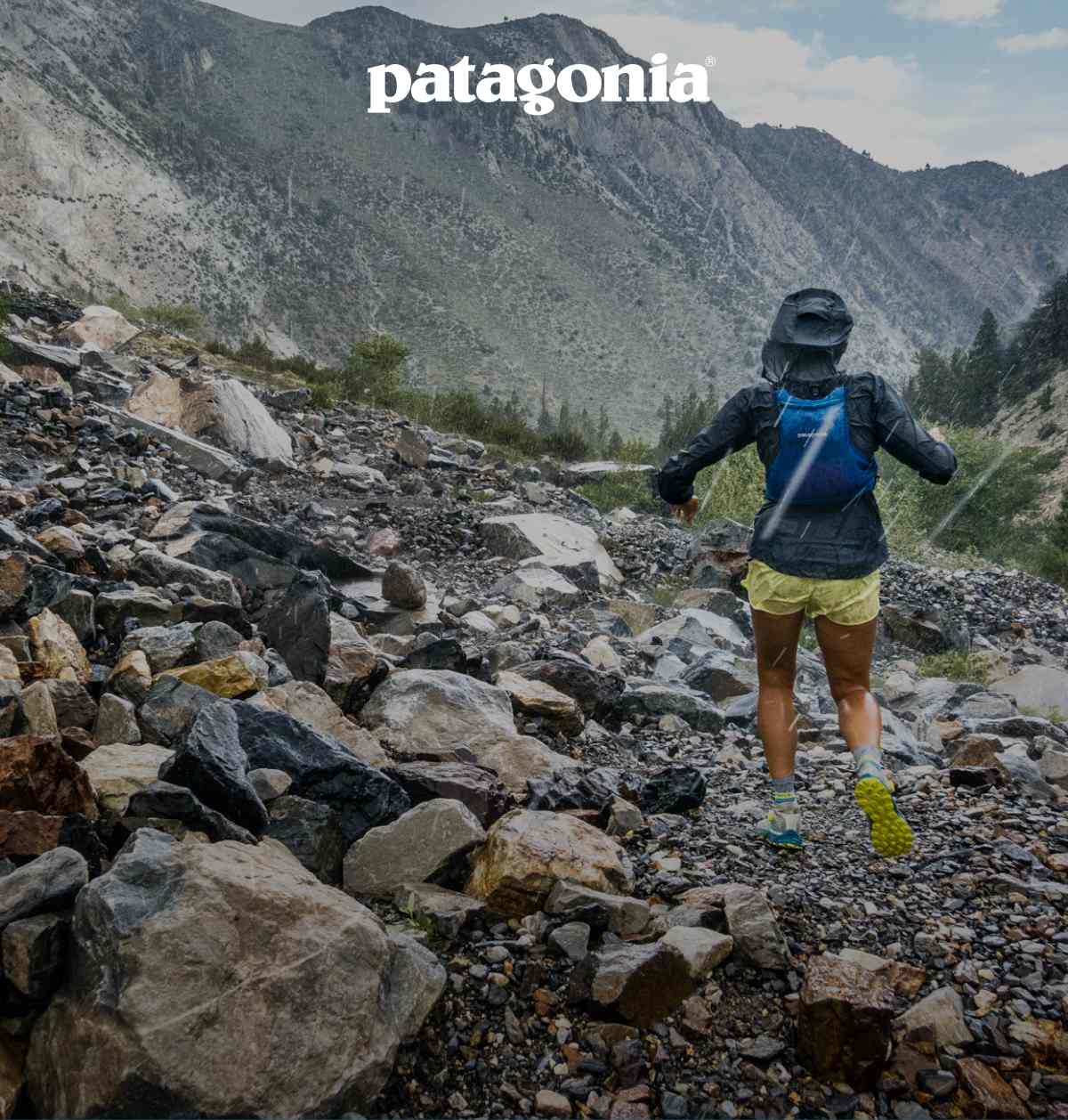 A person running through an area with lots of rocks.