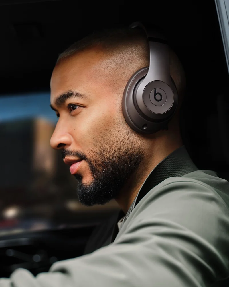 Man wearing Beats Studio Pro headphones