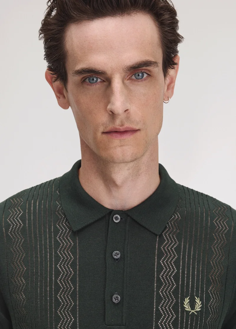 White male model wearing a Fred Perry Pointelle Panel Knitted Shirt in Night Green