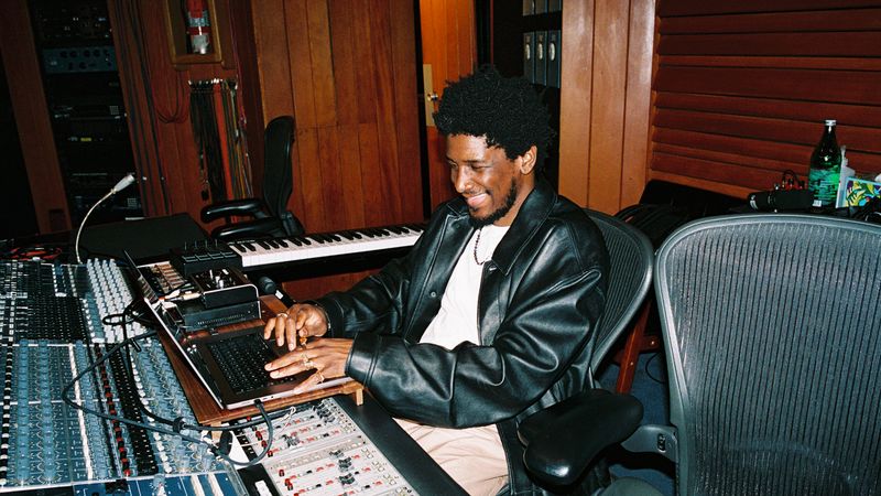 Image may contain: Labrinth, Adult, Person, Leisure Activities, Music, Musical Instrument, Musician, Performer, and Clothing