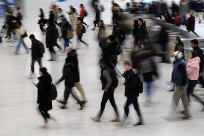 Commuters walk in New York City