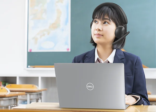 Girl Studying In Classroom