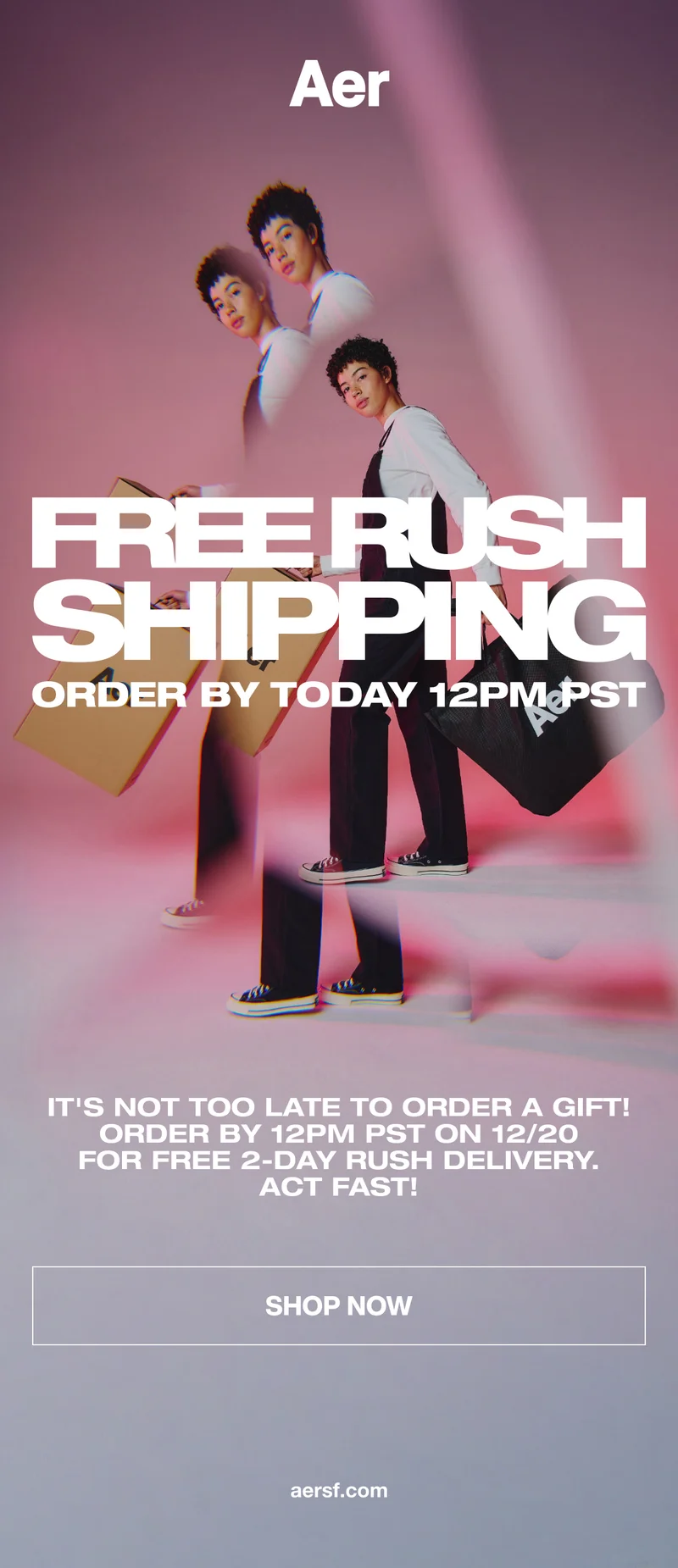 Last day for free rush shipping! Model holding Aer shipping boxes and shopping bags.