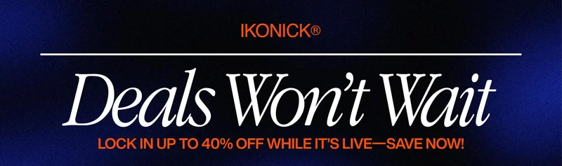A dark blue textured banner with the IKONICK® logo in orange at the top. Large white serif text reads “Deals Won’t Wait,” with a thin white line above it. Below, bold orange text says “LOCK IN UP TO 40% OFF WHILE IT’S LIVE—SAVE NOW!”