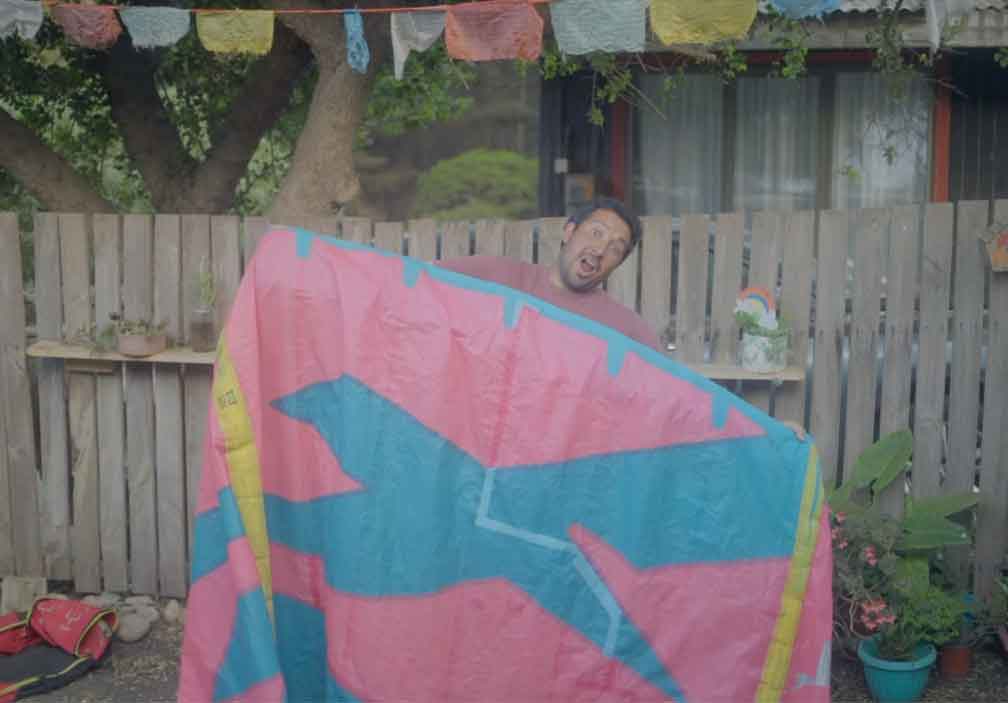 A person holding a kite.