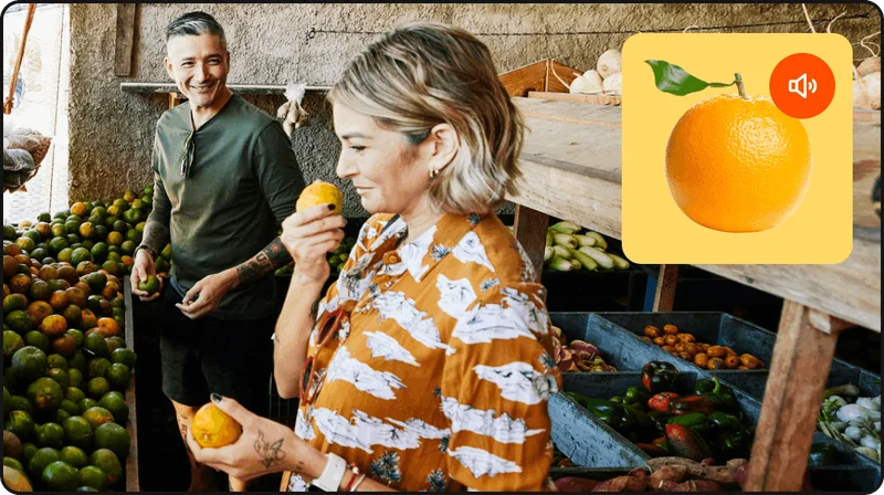 woman holding an orange