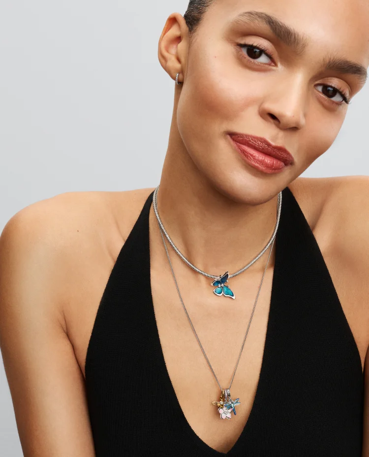 Model wearing Pandora necklaces