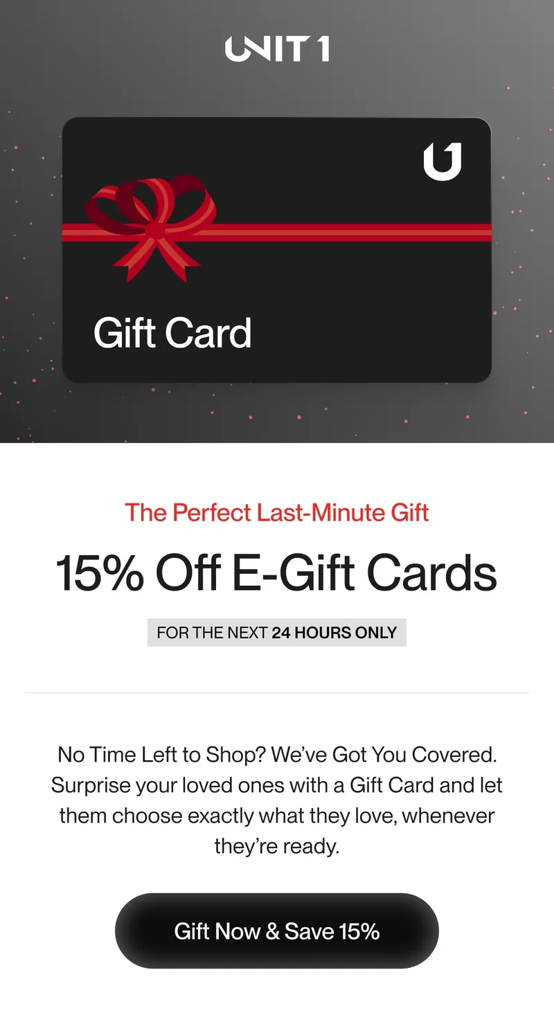 Black Unit 1 gift card with a red ribbon bow, designed for gifting smart cycling gear.