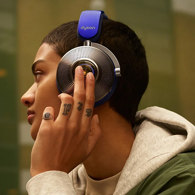 Woman wearing the Dyson Zone noise-cancelling headphones
