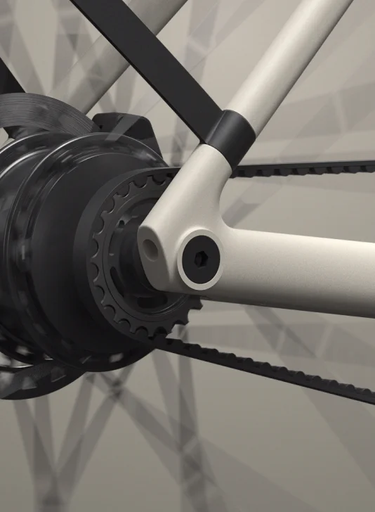 A photographic render of the motor located in the rear wheel of the bike.
