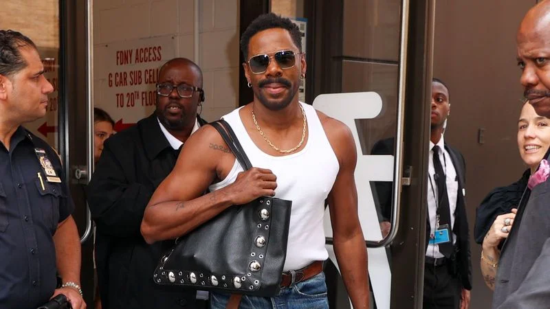 Image may contain: Colman Domingo, Elly Tumwine, SL Jones, Clothing, Pants, Footwear, Shoe, Jeans, Accessories, and Bag
