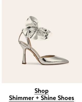 A pointed-toe pump with a bow detail.