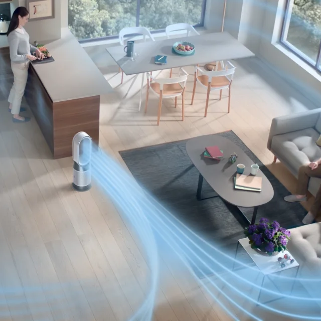 The Dyson Purifier Hot+Cool™ Gen1 purifying fan heater circulating air in a kitchen and living room