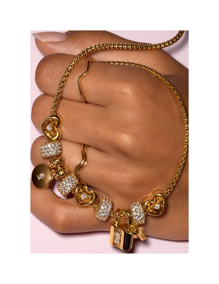 Hands wearing Pandora jewelry