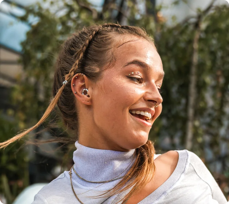 Girl dancing wearing Loop Experience in Silver