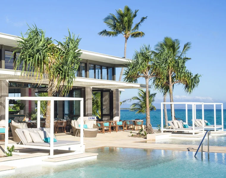 An expansive pool overlooking the ocean at InterContinental Hayman Great Barrier Reef in Australia.