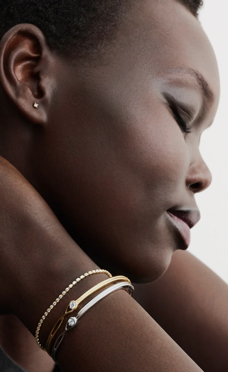 Model wears three Pandora Lab-Grown Diamonds bracelets